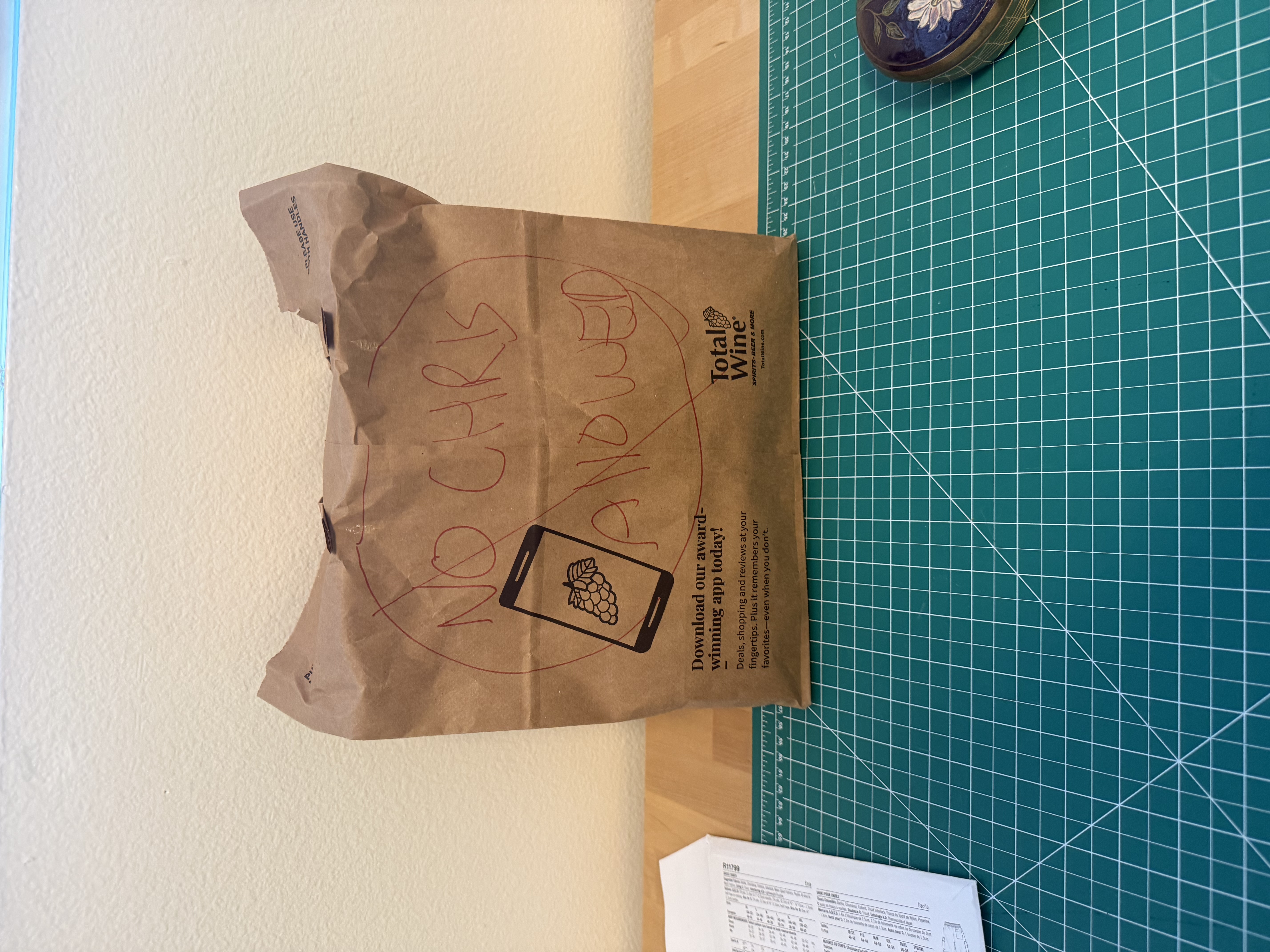 A paper bag taped up with 'No Chris Allowed' written on it in marker
